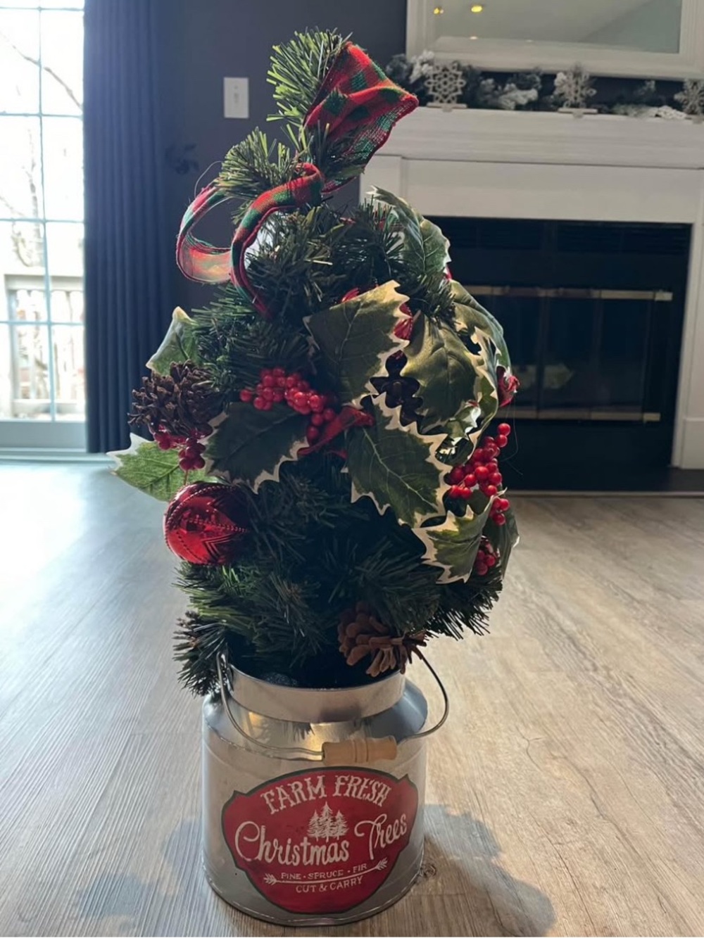 Rustic Christmas Tree with Red Berries and Plaid Bow